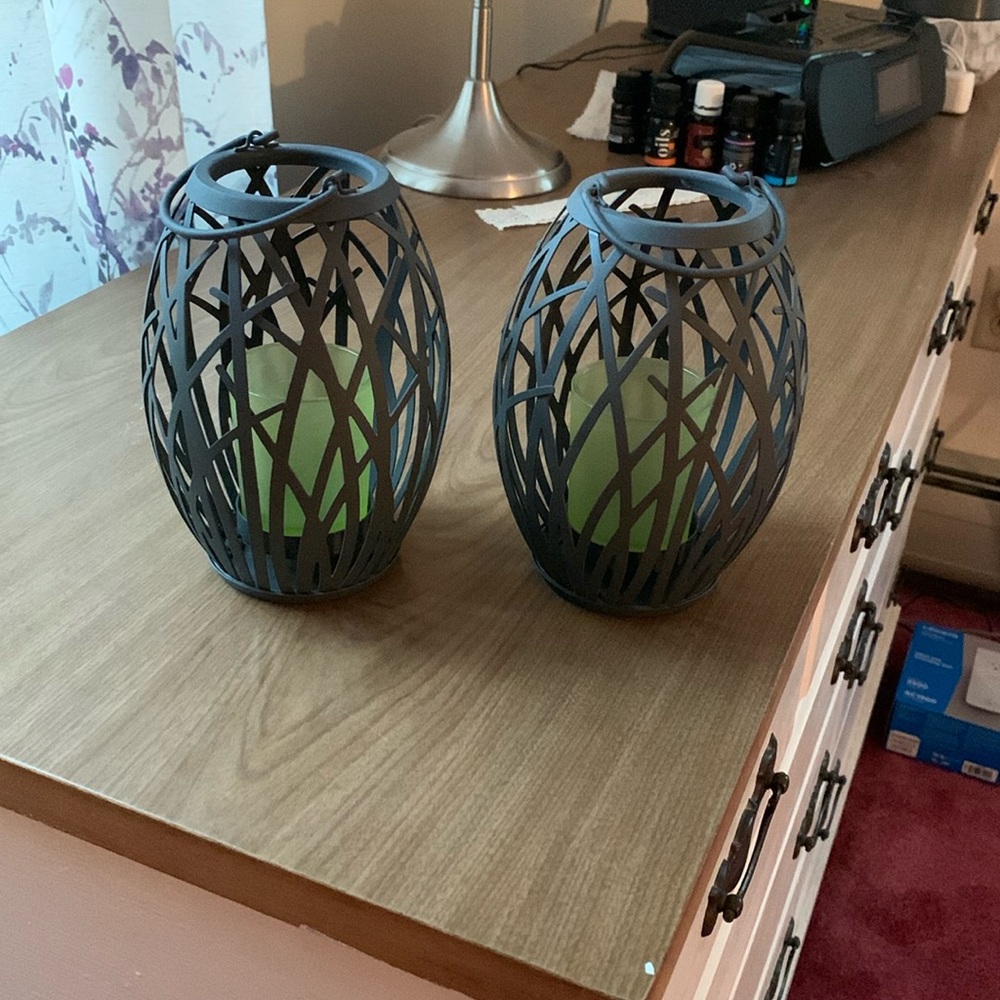 Brushed metal candle holders